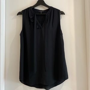 Black tank top blouse with ruffles and bow on neck